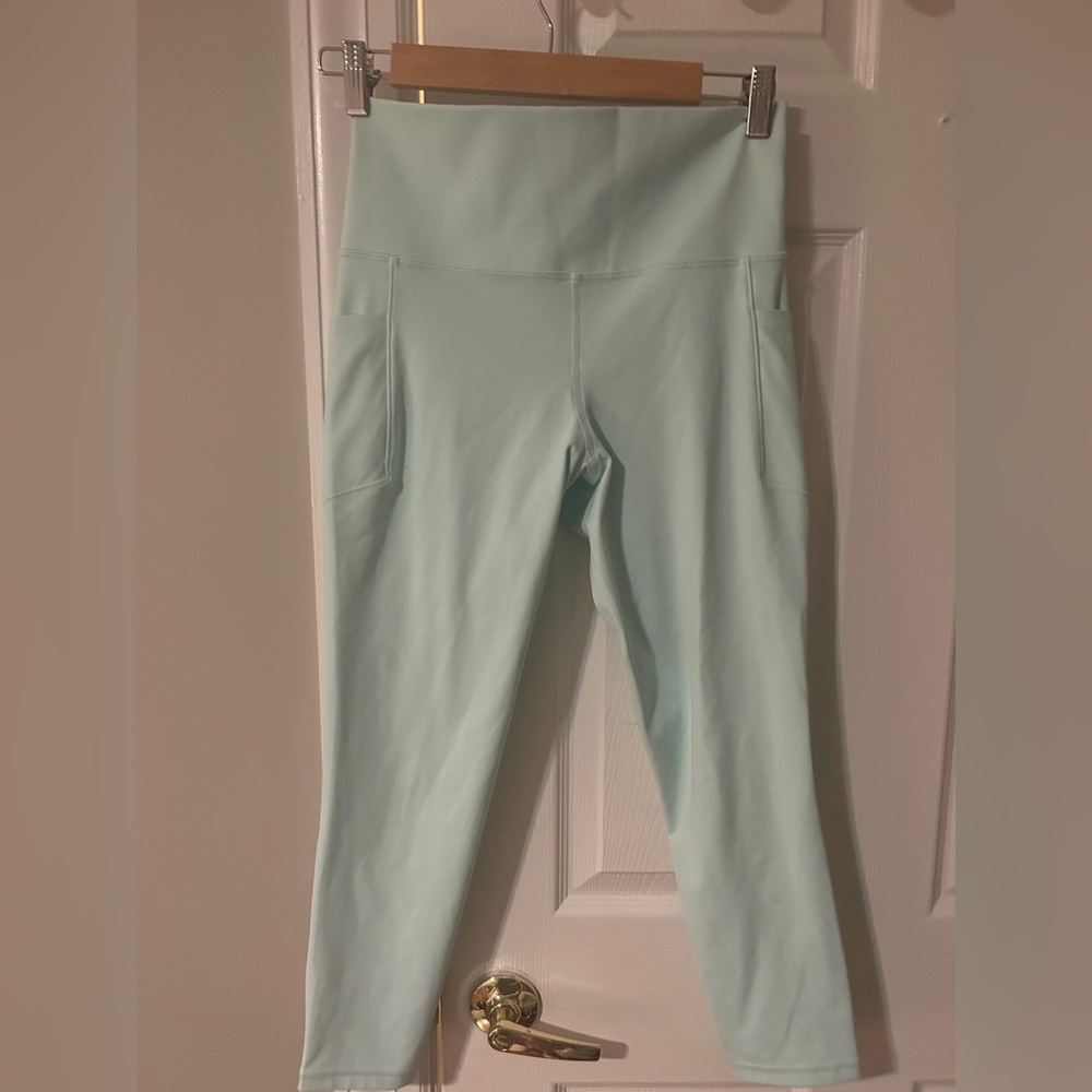 Reef green Athleta leggings salutation stash pocket 7/8 inch